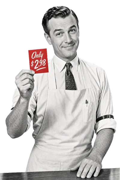 A 1950s grocer holding up a red price card